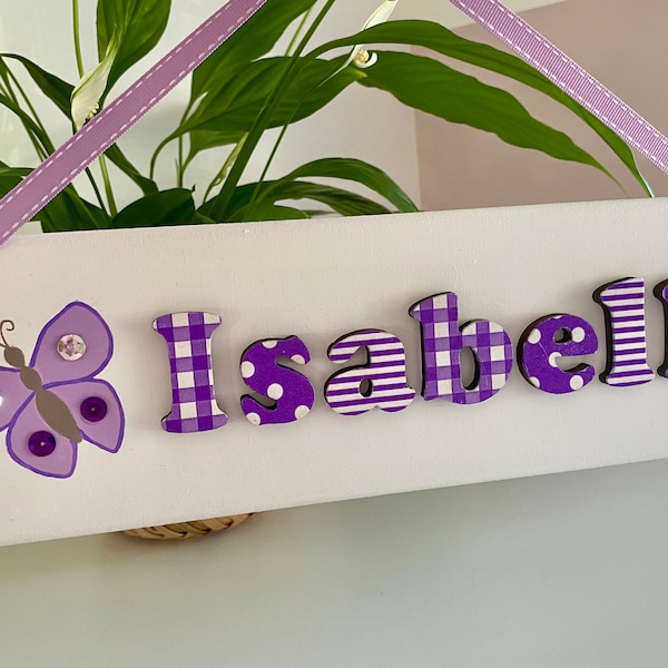 Personalised handmade wooden door name plaque: purple and white design with butterfly illustration