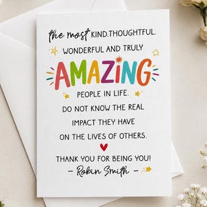 May include: A white greeting card with black text that reads: the most KIND, THOUGHTFUL, WONDERFUL AND TRULY AMAZING PEOPLE IN LIFE. DO NOT KNOW THE REAL IMPACT THEY HAVE ON THE LIVES OF OTHERS. THANK YOU FOR BEING YOU! - Robin Smith - with a red heart.