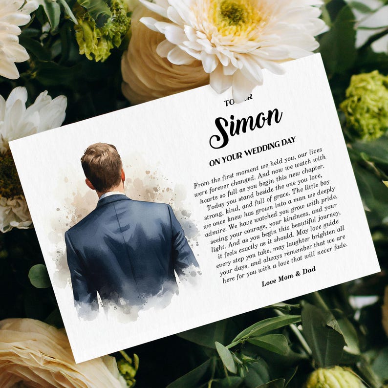 Puede incluir: Una tarjeta de boda rectangular con una ilustraci&oacute;n en acuarela de una persona con traje azul oscuro vista desde atr&aacute;s. El texto dice: TO SIMON ON YOUR WEDDING DAY, seguido de un mensaje sincero de Mom & Dad, impreso en tinta negra.