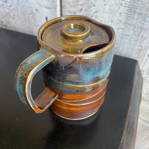 pottery to go mug with lid