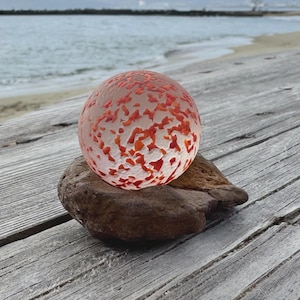 Extra Large Sea Marble 1 3/8&quot; Red Confetti Pattern with Display Stone, Rare Black Sea Surf-Tumbled Marble, Beachcombed Collectible