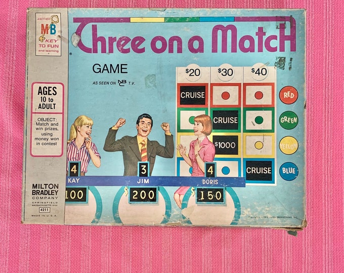 Vintage Board Game “Three on a Match” in box with lots of playing pieces including instructions and rules.