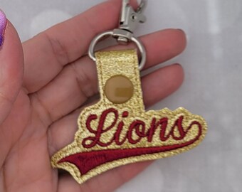 Porte-clés Lions Swoosh Snap Tab - Fabriqué à la main avec du vinyle imitation cuir marin