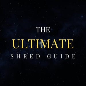 Peut inclure: Un guide de fitness noir avec le titre "THE ULTIMATE SHRED GUIDE" en lettres dorées. Le guide comprend également le texte "8-WEEK FAT LOSS BLUEPRINT FOR MAXIMUM RESULTS" et "PHYSIQLAB FITNESS GUIDE" sur un fond étoilé.