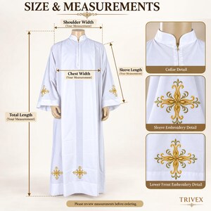 May include: A white liturgical alb featuring a mandarin collar with a front zipper, long sleeves, and gold embroidered cross motifs on the sleeves and lower front. The image includes text labels for shoulder width, chest width, and total length.