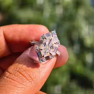 A romantic close-up of the NovaLux Jewels ring held in a luxury velvet box, ready for a surprise proposal. The focus is on the radiant symmetry of the Dutch marquise cut and the symbolic strength of the mounting. The brilliant facets catch the light, creating an aspirational visual for a "dream proposal" and a lifetime of shared, sophisticated sparkle.