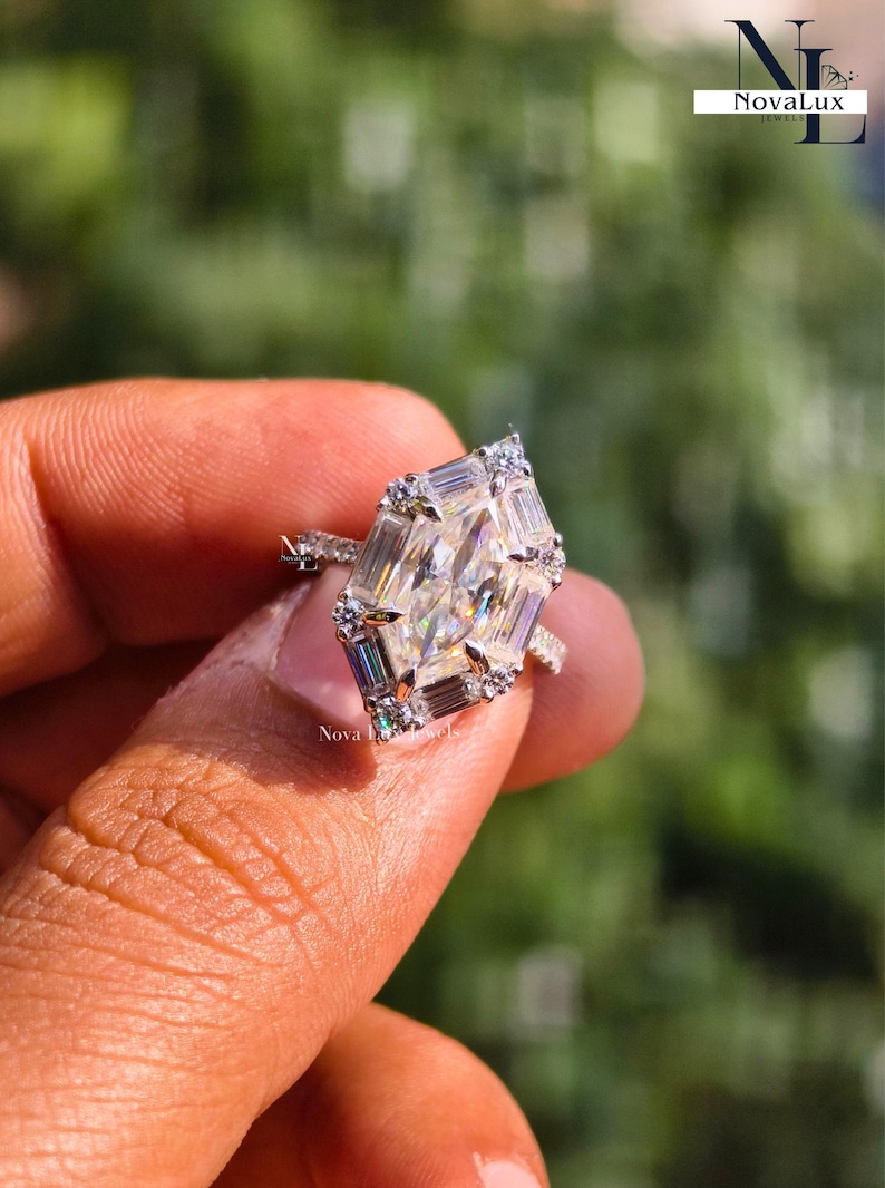 A romantic close-up of the NovaLux Jewels ring held in a luxury velvet box, ready for a surprise proposal. The focus is on the radiant symmetry of the Dutch marquise cut and the symbolic strength of the mounting. The brilliant facets catch the light, creating an aspirational visual for a "dream proposal" and a lifetime of shared, sophisticated sparkle.