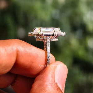 A technical macro shot focusing on the point where the pave-set band meets the prong basket. The image reveals the clean lines, expert metalwork, and flawless high-polish finish characteristic of the NovaLux Jewels workshop. This detail shot targets discerning buyers who prioritize the technical execution and structural quality of artisanal fine jewelry in their bridal collection