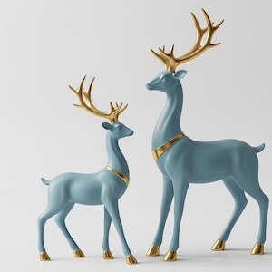 May include: Two blue deer sculptures with gold antlers and accents. The text "STL 3D DIGITAL FILE" is at the top. The deer have long necks and are standing on four legs. The antlers and accents are gold.