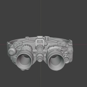 May include: A gray night vision goggle device with two large circular lenses and multiple smaller circular components. The device is mounted on a head strap and is designed for low-light or no-light conditions. The overall design is technical and utilitarian.