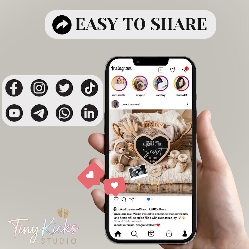 May include: A smartphone displays an Instagram post announcing a baby's arrival, with a heart-shaped sign reading "We've been keeping a little secret." The image includes baby shoes, a teddy bear, and social media icons.