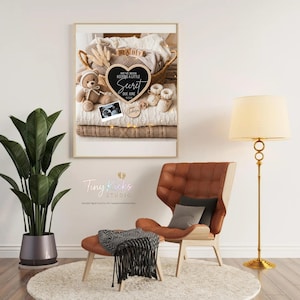 May include: A framed pregnancy announcement featuring a heart-shaped chalkboard that reads "We've been keeping a little secret due June 2024." The announcement includes a teddy bear, baby booties, and a sonogram image. The frame is set against a backdrop of folded blankets.