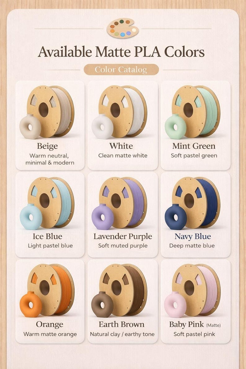 May include: A color catalog showcasing nine matte PLA filament colors. Colors include beige, white, mint green, ice blue, lavender purple, navy blue, orange, earth brown, and baby pink. Each color is displayed with a spool of filament and a small donut-shaped sample.