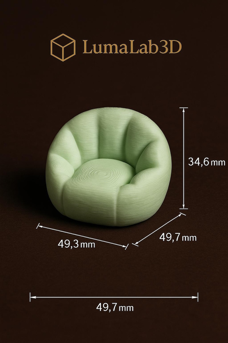 Puede incluir: Una silla redondeada de color verde claro con una superficie texturizada. La silla mide 49,7 cm de ancho, 49,3 cm de profundidad y 34,6 mm de alto. El texto "LumaLab3D" est&aacute; presente.