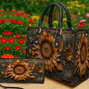 May include: A handbag and wallet set with a 3D sunflower design. The bag has black handles and gold-coloured hardware. The wallet has a wrist strap. The set is brown, with a textured, distressed appearance. The background is a blurred garden.