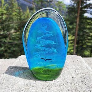 Herdenkingssteen voor crematie van geblazen glas, oprijzende geest