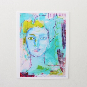 May include: Abstract art print featuring a stylized portrait of a person. The face is painted in shades of blue, with green eyes and a red outline. The background has splashes of turquoise, yellow, and purple.