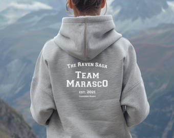 Sudadera con capucha unisex clásica Raven Saga con cremallera, sudadera con capucha Team Marasco de Cassandra Roman