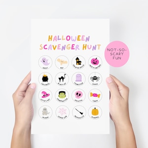 May include: A Halloween scavenger hunt printable with colorful illustrations of ghosts, bats, and pumpkins. The text "Halloween Scavenger Hunt" is at the top, with "Not-So-Scary Fun" in a pink circle. The image is held by two hands.