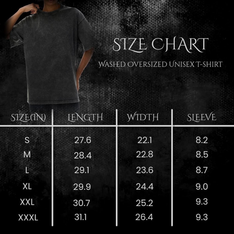 May include: A size chart for a washed oversized unisex t-shirt. The chart displays measurements in inches for sizes S through XXXL. The shirt is dark gray and appears to be worn. The chart includes length, width, and sleeve measurements.