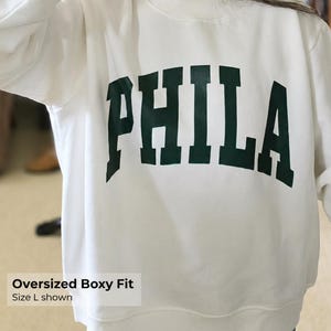 Oversized Boxy Fit
Size L shown (white fleece)