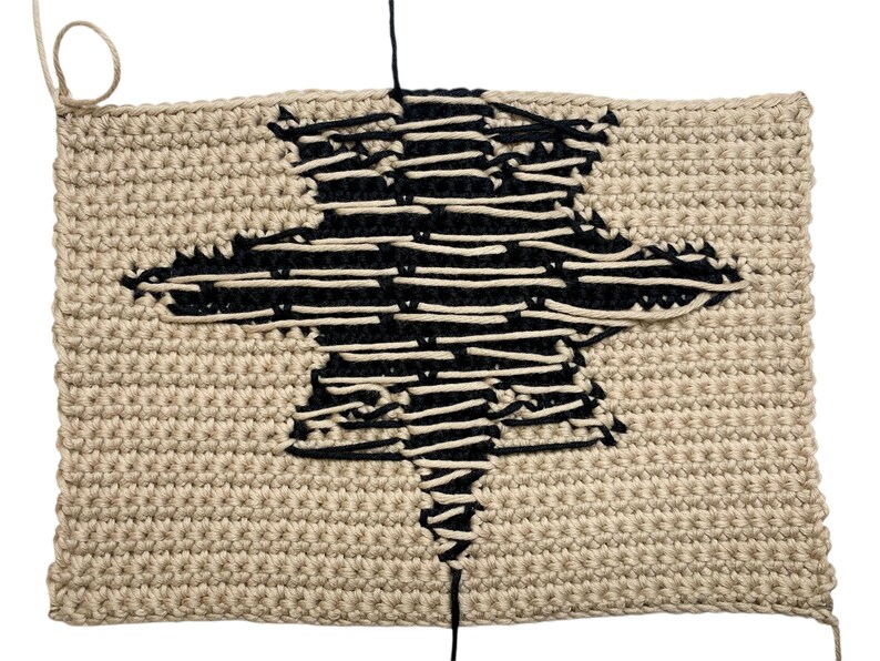 Modern crochet wall hanging pattern featuring a bold black eight-pointed star on a neutral background. This is a digital PDF pattern for instant download, not a finished product.