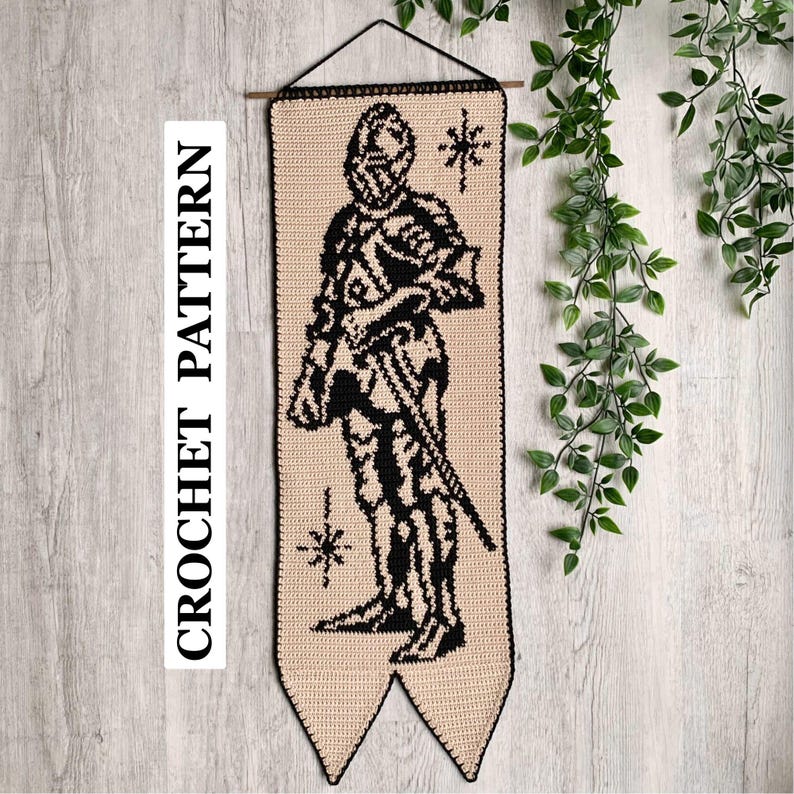 Crochet tapestry pattern for a medieval-style wall hanging with a black knight motif on a beige background.