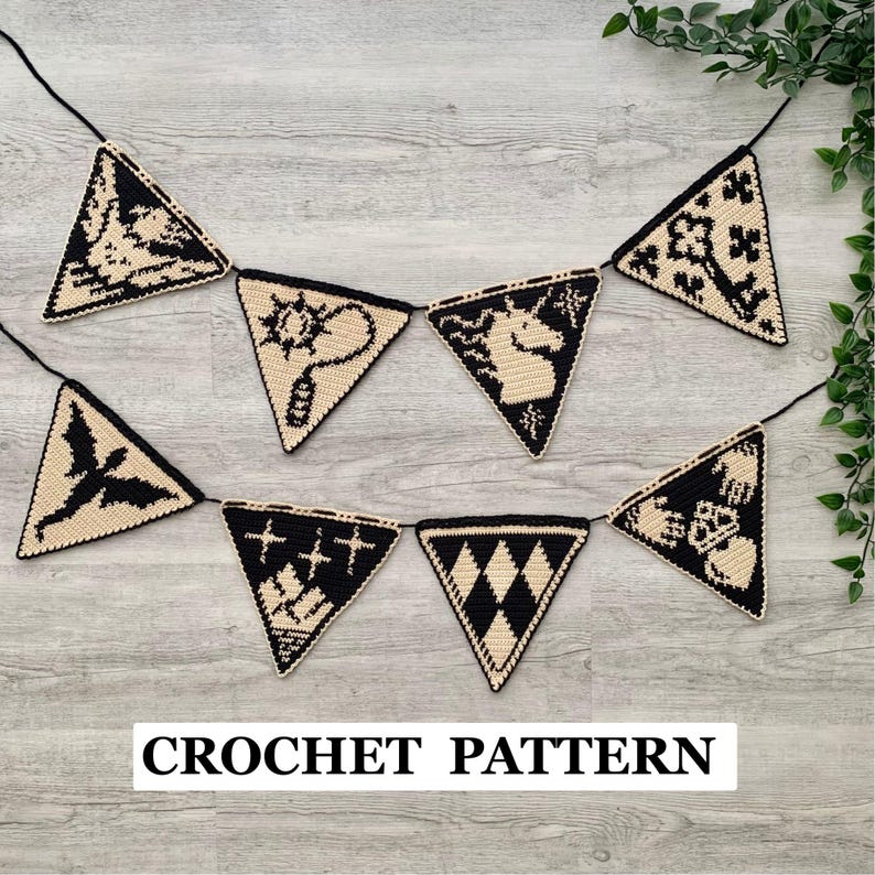 May include: A black and cream-colored crochet banner with triangular pennants. Each pennant features a different design, including a key, a unicorn, and a lightbulb. The text "CROCHET PATTERN" is displayed at the bottom.