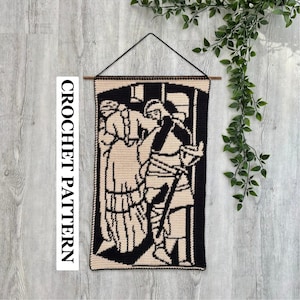 May include: A rectangular crochet wall hanging featuring a black and beige graphic design of two figures in historical attire. The piece is suspended from a wooden rod with a black string. The text CROCHET PATTERN is printed vertically in black.