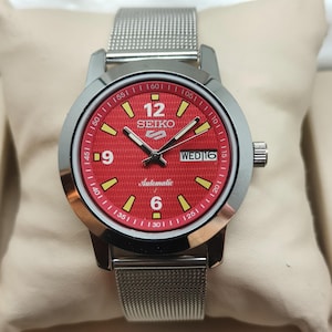 Vintage Seiko 5 Automatic Watch: Pink Dial, Stainless Steel, 17 Jewel