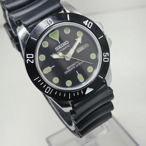 Refurbished Seiko 5 Automatic Watch: Black Dial, Stainless Steel, Rubber Strap