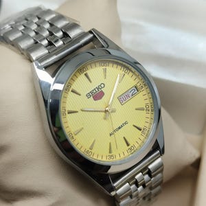 Vintage Seiko 5 Automatic Watch: Yellow Dial, Stainless Steel, 37mm
