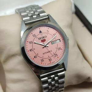 Vintage Seiko 5 Automatic Watch: Pink Dial, Stainless Steel, Refurbished