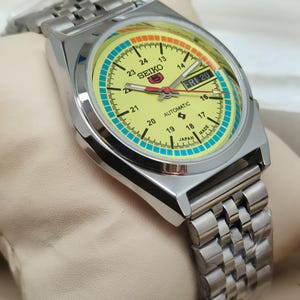 Vintage Seiko 5 Automatic Watch: Yellow Dial, 17 Jewels, Refurbished