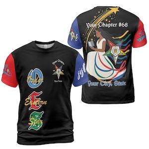 May include: Black t-shirt with red and blue sleeves. The front features the words "Order", "Eastern", and "Star" in blue, red, and green. The back displays a woman in a white dress, a star, and the text "Your Chapter #68" and "Pour City, State".