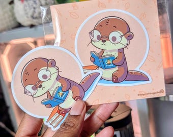 Bookish Otter Sticker – Kawaii Reading Animal, Waterproof Vinyl Decal