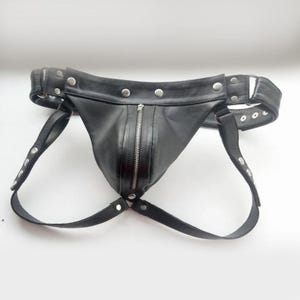 Handcrafted Men’s Black Leather Jockstrap with Removable Codpiece Fetish Thong Underwear for Bondage and Costume Play ( DUTY PAID USA )