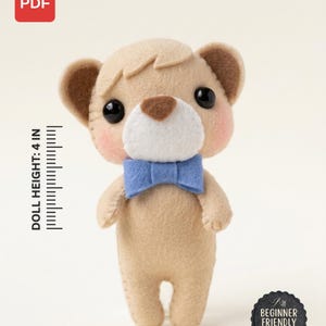 May include: A beige felt bear doll with black eyes, a white muzzle, and a blue bow tie. The doll has pink cheeks and measures 4 inches in height. Text on the image reads: PDF PATTERN. INSTANT DOWNLOAD. NOT A FINISHED TOY. BEGINNER FRIENDLY.