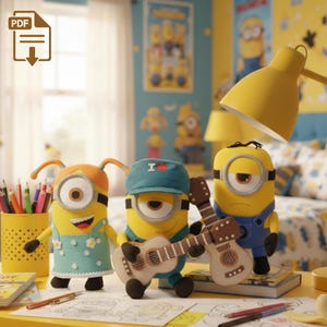 May include: Three plush Minion characters, each with distinct features. One wears an orange headband, another a blue cap with "I ❤️" on it, and the third has a single eye. The middle Minion holds a felt guitar. The scene is set on a desk with pencils and drawings.