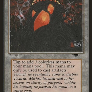 May include: A collectible trading card titled Mishra's Workshop, featuring a dark, hooded figure with glowing orange eyes and a crown of amber stones. The card text describes its ability to add three colourless mana for casting artefacts.
