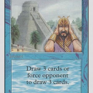May include: A blue Magic: The Gathering trading card titled Ancestral Recall. The illustration depicts a bearded figure in a golden helmet and purple garment standing before a stone pyramid. The text reads: Draw 3 cards or force opponent to draw 3 cards.