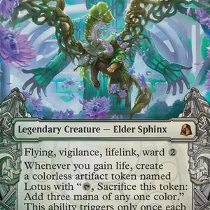 May include: A Magic: The Gathering trading card titled Kwia Vigorbloom, a green and white legendary creature Elder Sphinx. The artwork depicts a winged, plant-like creature surrounded by purple flowers against a pale, architectural background.