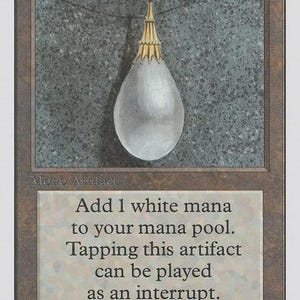 May include: A collectible trading card titled Mox Pearl featuring a white teardrop-shaped pearl pendant with a gold cap hanging on a thin chain against a textured grey background. The card text reads Add 1 white mana to your mana pool. Tapping this artifact can be played as an interrupt. The card has a brown border and the number 0 in the top right corner.