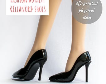 May include: A pair of black high-heeled pumps with a glossy finish. The text on the image reads Fashion Royalty Eleanor Shoes and 3D-printed physical item. These shoes feature a pointed toe and a slender stiletto heel, designed for doll figures.