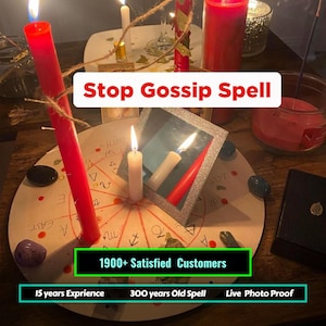 May include: A round wooden board featuring hand-drawn astrological symbols and cardinal directions, with a lit white candle, a square mirror, and a tall red candle. Text reads: Stop Gossip Spell, 1900+ Satisfied Customers, 15 years Experience, 300 years Old Spell, Live Photo Proof.