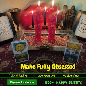 May include: A spiritual altar setup featuring two red figure candles with lit wicks, tarot cards, and other ritualistic items. The text "Make Fully Obsessed" is displayed prominently. Additional text includes "15 years Exprience" and "1300+ HAPPY CLIENTS".