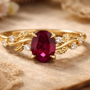 May include: A set of three ceramic mugs with a speckled, matte finish. The mugs are in shades of cream, light gray, and dark gray. Each mug has a simple, minimalist design, perfect for coffee or tea.