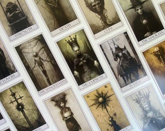 May include: A set of tarot cards with dark, gothic imagery. Each card displays a unique illustration with titles such as "Strength," "Death," and "The Magician." The artwork is primarily monochrome, with a vintage style.