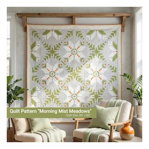 May include: A large quilt with a floral pattern in shades of grey, white, green, and orange is displayed on a wall. The quilt, measuring 216cm x 216cm, features the text "Quilt Pattern 'Morning Mist Meadows'". The quilt is hung on a wooden beam.