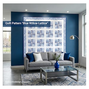 May include: A contemporary living room with a grey sofa, blue and white cushions, and a glass-topped coffee table. The wall displays a large quilt pattern, titled "Blue Willow Lattice". A blue vase adds a pop of colour.